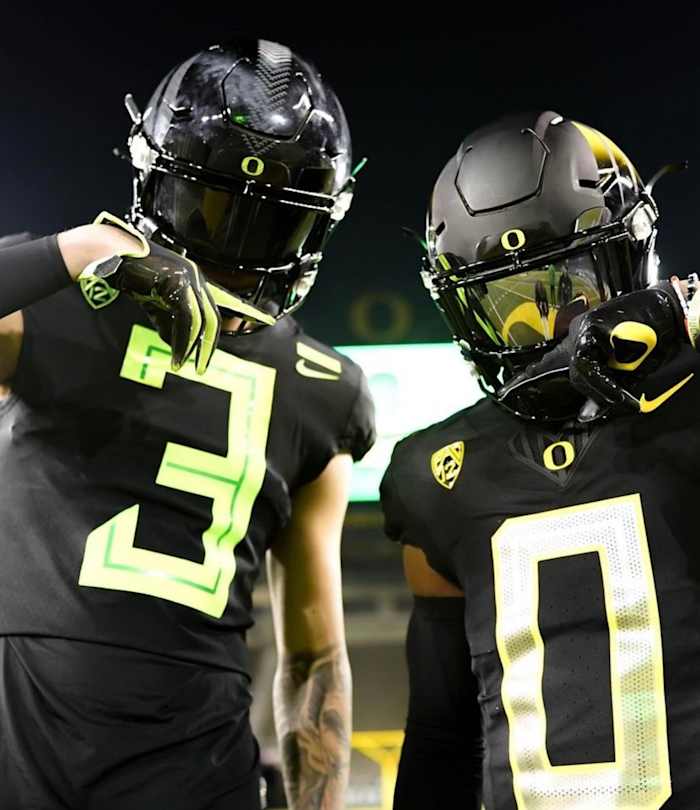 Kyler Kasper poses with Oregon CB Cole Martin during a visit to Eugene inside Autzen Stadium.
